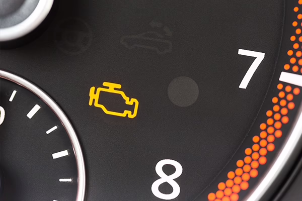 Check engine light close-up on gauge