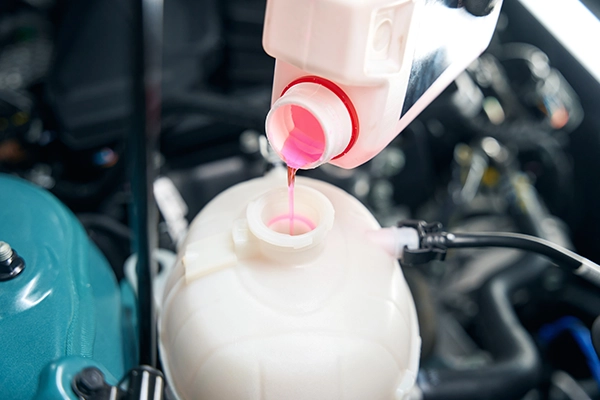 coolant pouring into reservoir
