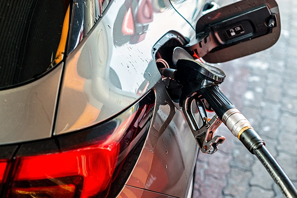 gas pump filling a car
